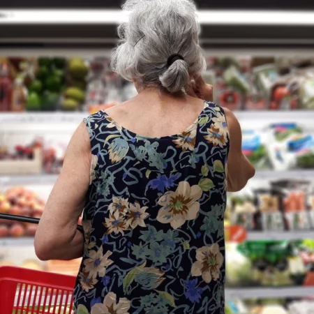 Senior Woman Shopping In Supermarket